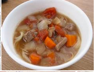 beef and vegetable soup in bowl