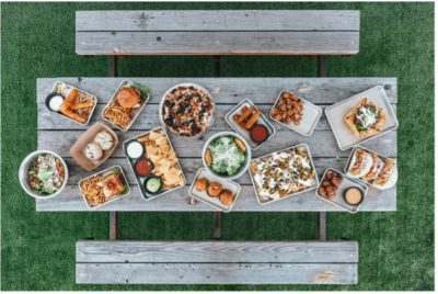 aerial view of picnic table with summer meals on it