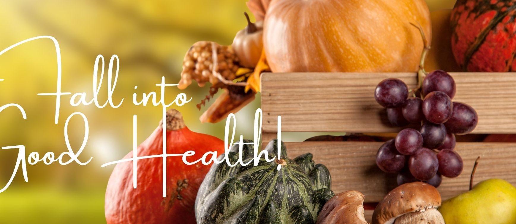 crate of fruits and vegetables with words fall into good health