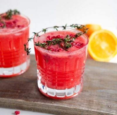 two glasses of cranberry orange mocktail